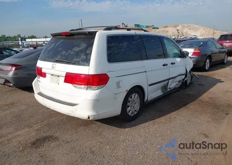 2010 Honda Odyssey Lx z USA, uszkodzony, nr VIN 5FNRL3H21AB037857